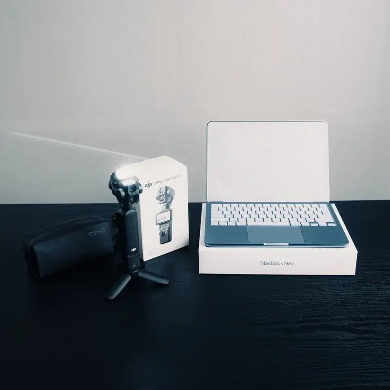 DJI Osmo Pocket 4 Pro, a MacBook and a DJI Neo drone